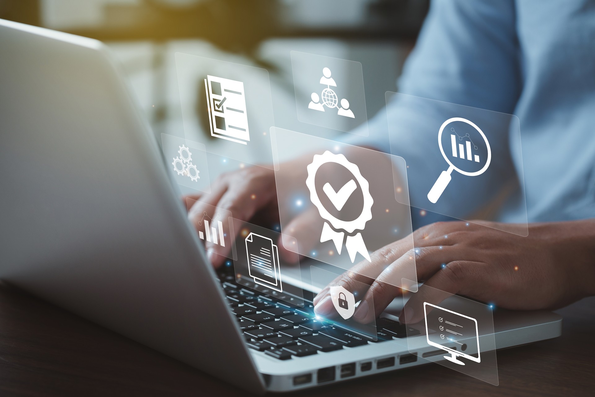 Businessman working on laptops with signs of the top service Quality control certification checked guarantees of the standard of company product. Concept on virtual screen.